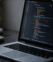 Laptop with code on screen